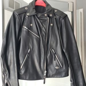 Harley Davidson leather jacket, worn twice so it needs you!!
